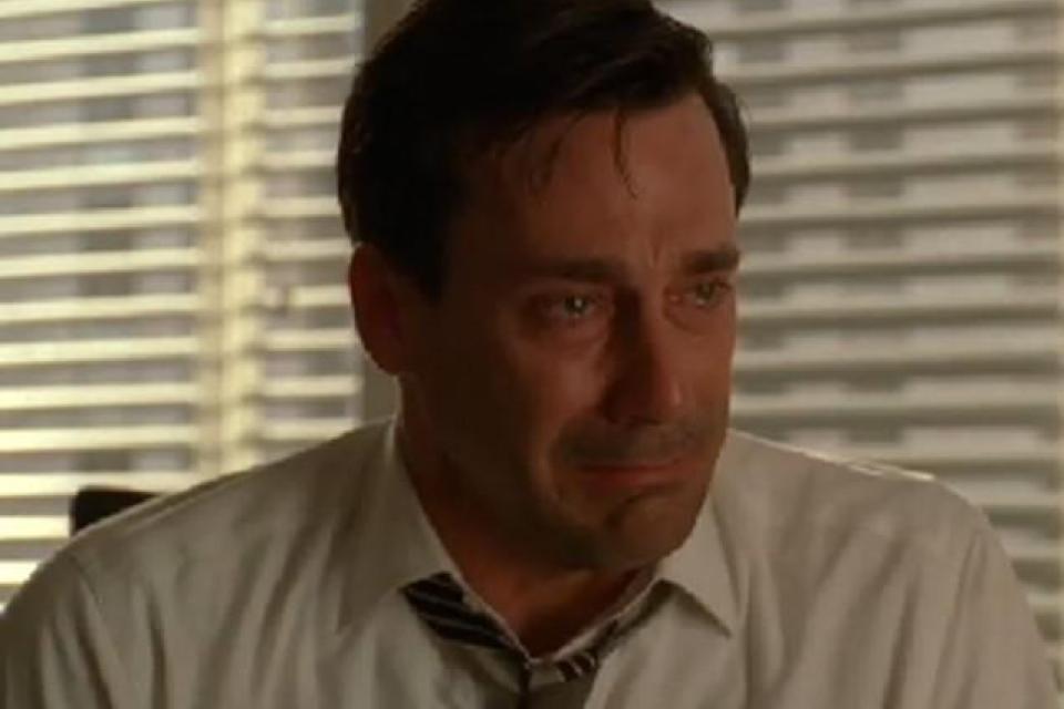 Jon Hamm crying in an office